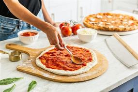 img 3 attached to 🍕 Cuzi Gourmet Deluxe 4-Piece Pizza Stone Set - 13" Thermal Shock Resistant Cordierite Pizza Baking Stone, 19" Natural Bamboo Pizza Peel & Pizza Cutter Rocker - Large Pizza Stone for Grill and Oven