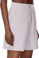 🩳 comfortable and stylish women's bermuda shorts: loose fit with pockets and drawstring - perfect for walking, workout, and yoga logo