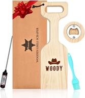 🔥 introducing the woody wood grill scraper: natural cedar wood bbq grate cleaner tool with meat thermometer & basting brush – a safe alternative to wire metal bristles – the ultimate wooden grill scraper logo