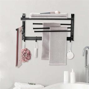 img 2 attached to 🧺 Space-Saving Foldable Swivel Clothes Drying Rack - Wall Mounted Laundry Organizer with Hooks and Swing Arms for Bathroom, Laundry, Kitchen - 23.7" 5 Rods