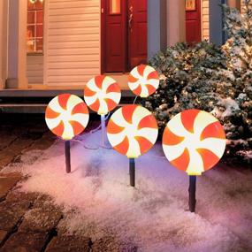 img 2 attached to 🎄 RECESKY Christmas Pathway Lights - 7.7Ft 4 Candy Stakes Light with Warm White Bulbs - Fairy Christmas Lighting for Outdoor Yard Driveway Sidewalk Walkway Landscape Christmas Decorations" -> "RECESKY Christmas Pathway Lights - 7.7Ft 4 Candy Stakes Light with Warm White Bulbs - Fairy Christmas Outdoor Yard Driveway Sidewalk Walkway Landscape Decorations