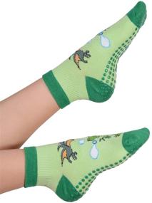 img 1 attached to 🦖 FOOTSIS Yoga Grip Socks: Non Slip, Ideal for Pilates, Barre, Home, Hospital, Mommy and Me Classes - Dinosaur Print