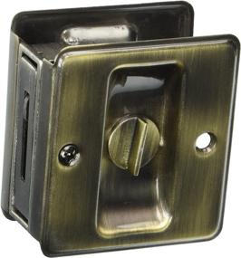 img 2 attached to Schlage Antique Brass Pocket Artisan Sliding Door Lock, 2-1/4 x 1-3/4 Inches, Privacy