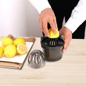 img 1 attached to 🍊 Citrus Juicer, Sunhanny Orange Lemon Manual Hand Squeezer, Anti-Slip Lid Rotation Reamer Lime Press, 17-Ounce Transparent Black Capacity