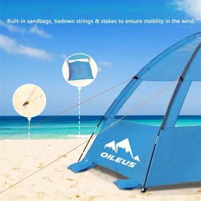 img 1 attached to 🏖️ Oileus Portable Beach Tent for 2-3 People - Sun Shade Shelter with UV Protection, Extended Floor, Ventilating Mesh Windows, Carrying Bag, Stakes, 6 Sand Pockets - Ideal for Fishing, Hiking, Camping - Blue