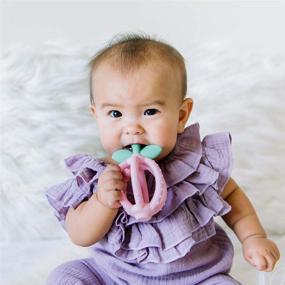 img 1 attached to 🍋 Itzy Ritzy BPA-Free Teething Ball & Training Toothbrush - Silicone Bitzy Biter Lemon Teething Ball with Textured Design for Soothing Gums, Easy-to-Hold Design, Pink Lemonade