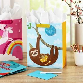 img 3 attached to 🎁 Hallmark 13" Большие подарочные пакеты для детей на день рождения - ассортимент ленивца, динозавра, единорога с тканью для упаковки (набор из 3-х подарочных пакетов, 9 листов)