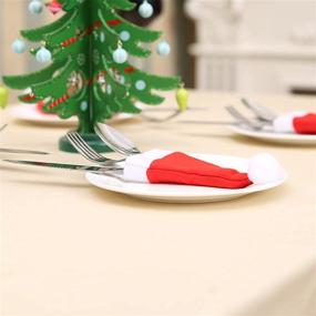 img 2 attached to 🎅 32 Pieces Gentlife Mini Santa Hats: Christmas Silverware Holders, Wine Bottles Covers, Handmade Xmas Party Table Decorations, Dinnerware Supplies, Flatware Decor for Dinner