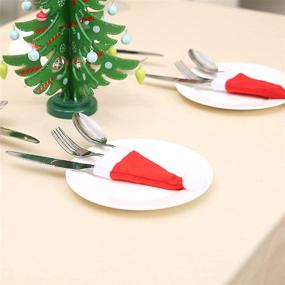 img 3 attached to 🎅 32 Pieces Gentlife Mini Santa Hats: Christmas Silverware Holders, Wine Bottles Covers, Handmade Xmas Party Table Decorations, Dinnerware Supplies, Flatware Decor for Dinner