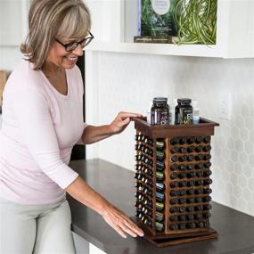 img 1 attached to 🌿 Rotating Wooden Essential Oil Rack - Aromatherapy Storage for 15ml Bottles | Ideal Shelf Display Holder, Table Diffuser Stand | Accommodates 182 Bottles