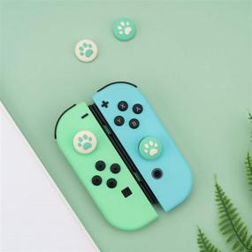 img 1 attached to 🎮 Enhance Your Gaming Experience with GeekShare 4PCS Silicone Cat Paw JoyCon Thumb Grip Set for Switch Lite and OLED – Vibrant Spring Green