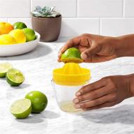 lemon juicer squeezer with non-slip abs material, strainer, and measuring cup - orange lime squeezer logo