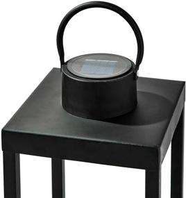 img 2 attached to 🕯️ 14 Inch Tall Solar Candle Holder Lantern with Waterproof Flameless Pillar Candle - Matte Black Metal Frame, Dusk to Dawn Timer - Large Size for Floor or Patio Fall/Autumn Decor - Battery Included