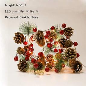 img 2 attached to 🎄 Sparkling Christmas Garland - 6.6ft 20 LEDs with Red Berry, Bells, and Pine Cone - Festive Battery Operated Copper String Warm Lights for Indoor/Outdoor Holiday Xmas Tree Mantle Party Decor