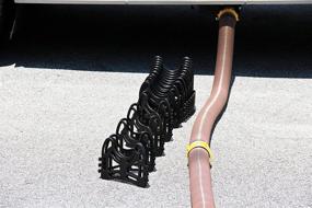 img 2 attached to 🚽 Camco 20 Ft (43051) Sidewinder RV Sewer Hose Support: Sturdy Lightweight Plastic, No Creep Closure, Holds Hoses in Place - No Straps Needed