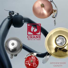 img 1 attached to 🔔 Crane Bike Bell: Authentic Suzu Mini Bell, Steel Clamp, Made in Japan for City Bikes, Cruisers, Road Bikes or MTB - Fits 22.2mm to 26.0mm Handlebars