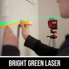 img 1 attached to 🔦 SKIL 100ft. 360° Green Self-Leveling Cross Line Laser Level with Horizontal and Vertical Lines, Rechargeable Lithium Battery and USB Charging Port, Compact Tripod and Carry Bag Included - LL9322G-01