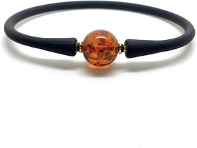 img 4 attached to Radiant Cognac Round Baltic Amber Bracelet with Black Rubber Band - Natural Sparkling Bead