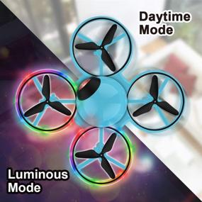 img 1 attached to 🚁 Dwi Dowellin 6.3 Inch Mini Drone for Kids with 10 Minutes Long Flight Time, Blinking Light, One Key Take Off, Spin, Crash Proof, RC Nano Quadcopter Toys Drones for Beginners Boys and Girls, 2 Batteries - Blue