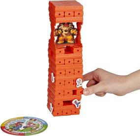 img 1 attached to Unleash Adventure with Hasbro Games Super Mario Jenga: A Block-Busting Classic!