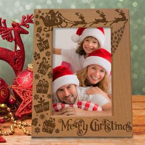 img 1 attached to KATE POSH Engraved Natural Wood Photo Frame - Celebrate Family Christmas with Love, Peace, Joy, and Hope. Santa, Reindeer, and Sleigh Decor, 4x6 Vertical Family Picture Frame