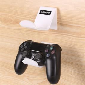 img 4 attached to 🎮 OAPRIRE Game Controller Holder Stand Wall Mount (2 Pack) for PS4 / Xbox One / Steam / Switch / PC Controller - Universal PS4 Xbox One Controller Accessories with Cable Clips - Stick on - White