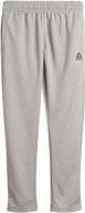 оптимизированный поиск: детские брюки-джоггеры reebok boys poly tricot fleece active jogger sweatpants логотип