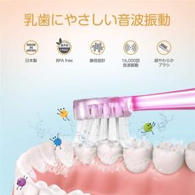 img 1 attached to BabySmile детская соническая электрическая зубная щетка для возраста от 0 до 12 лет (Сделано в Японии) с радужной LED-подсветкой, интеллектуальным таймером и двухступенчатым дизайном для улучшенного ухода за полостью рта. В комплекте идут 2 очень мягкие сменные насадки (голубые).