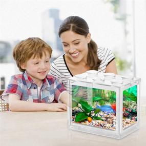 img 1 attached to 🐠 Betta Fish Tank - Transparent Stackable Cube Aquarium for Small Fish, Turtle, Jellyfish, Goldfish, Moss Balls, and Insects - Includes Plastic Plant Decoration - 34oz Capacity