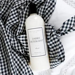 img 1 attached to 🧺 The Laundress - Darks Detergent 33.3 fl oz, Preserves Color & Fights Stains, Allergen-Free Dark Clothes Laundry Detergent, 64 Washes