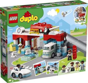 img 1 attached to 🏢 2021 Парковочный гараж и автомойка LEGO DUPLO: детская строительная игрушка с автомойкой, заправочной станцией и парковкой - 112 деталей.