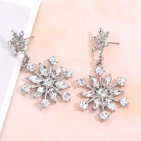 img 1 attached to Sparkling Christmas Snowflake Earrings: Rhinestone Dangle Studs for Women & Girls - Festive Xmas Costume Jewelry, Perfect Holiday Gift