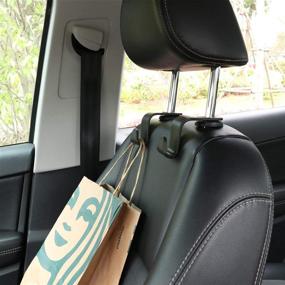 img 2 attached to LivTee 4-Pack Black Car Headrest Hooks for Handbags, Coats and Grocery Bags - Keep Your Car Organized!
