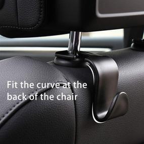 img 3 attached to LivTee 4-Pack Black Car Headrest Hooks for Handbags, Coats and Grocery Bags - Keep Your Car Organized!