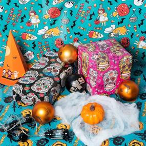 img 1 attached to 🎃 Halloween Wrapping Paper Set with Gift Tags and Pull Bows - Skull in Rose Red & Black Design - 19.68 x 27.55 inch - 2 Sheets by LeZakaa