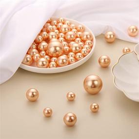 img 1 attached to Hicarer 120 Pieces Pearl Vase Filler Beads: Assorted Gold Round Faux Pearls for Home Wedding Decor, Makeup Brushes Holder, and Vase Decoration – 14/20/30 mm
