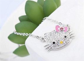 img 2 attached to 🎀 Stylish White Gold Plated Hello Kitty Bow Tie Pendant Necklace for Girls - Dazzling Multi-Color Cubic Zirconia Fashion Jewelry