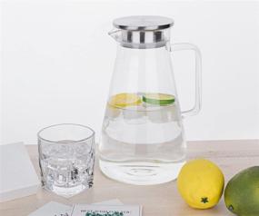 img 1 attached to 🥤 Purefold 68 oz Glass Pitcher with Lid for Hot/Cold Water, Household Kitchen Juice and Iced Tea Beverage Carafe with Handle