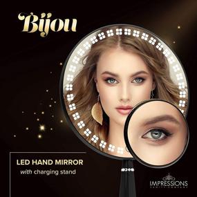 img 2 attached to 💡 Enhance Your Vanity Experience with the Impressions Bijou LED Hand Mirror: Round 5X Magnification, Touch Sensor, Adjustable Brightness In Sleek Black