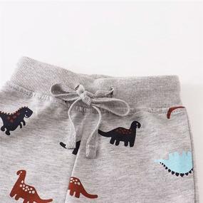 img 2 attached to 🦖 AOWKULAE Dinosaur Sweatpants: Elastic Drawstring Boys' Clothing for Comfortable Pants