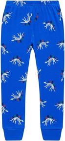 img 1 attached to 🦖 Dinosaur Skeleton Christmas Sleepwear for Boys - Festive Children's Clothing