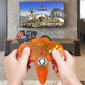 img 1 attached to 🎮 Kiwitatá N64 Controller 2-Pack: Classic Wired 64-bit N64 Game Pad Joystick for N64 Console - Red & Clear Orange