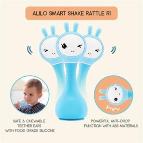 img 3 attached to 🎶 Blue Alilo Smarty Bunny Shake & Tell Musical Toy Rattle for Newborns and Infants - Soother with Lullaby Song Story, Music Player & Games