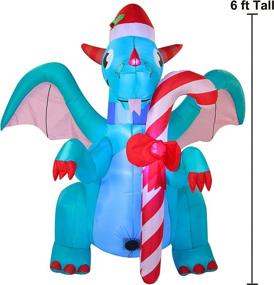 img 2 attached to 🐉 Joiedomi 6 FT Tall Inflatable Green Dragon with Candy Cane: Festive Christmas Party Decoration & Winter Décor with LED Lights for Indoor, Outdoor, Yard, Garden, Lawn