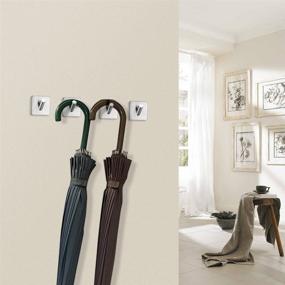 img 1 attached to 🪝 FOTYRIG Heavy Duty Stick on Wall Hooks - 4 Packs for Bathroom, Home, Kitchen, and Office - Wall Hooks for Hanging Towels, Clothes, and more