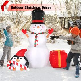 img 2 attached to 🎅 SOLEDI 6 FT Christmas Inflatables: Giant Snowman Penguin Outdoor Decorations with Built-in LED Lights - Xmas Blow up Snow Man Inflatable for Yard, Garden, Patio, Lawn Party Decor, Indoor Use