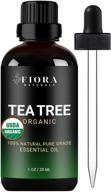 масло чайного дерева fiora naturals - 100% чистое органическое масло мелалеукы альтернифолии для лица, волос, кожи, прыщей, кожи головы, стопы и ухода за ногтями - 1 унция / 30 мл логотип