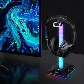 img 1 attached to 🎧 Подставка для игровых наушников XERGUR RGB - многопортовая стойка для гарнитур с 3,5 мм AUX и двумя USB-портами, держатель наушников для игровых аксессуаров