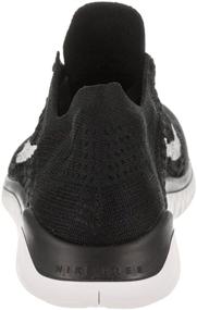 img 2 attached to 👟 Black White Women's Shoes from NIKE featuring Flyknit Technology