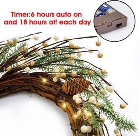 img 2 attached to 🎄 FRISTMAS 18" Pre-lit Christmas Wreath with Metal Hanger - Battery Operated LED Lighted Winter Decoration Wreath for Front Door - Timer Function & Warm Lights - Outdoor & Indoor Xmas Wreaths